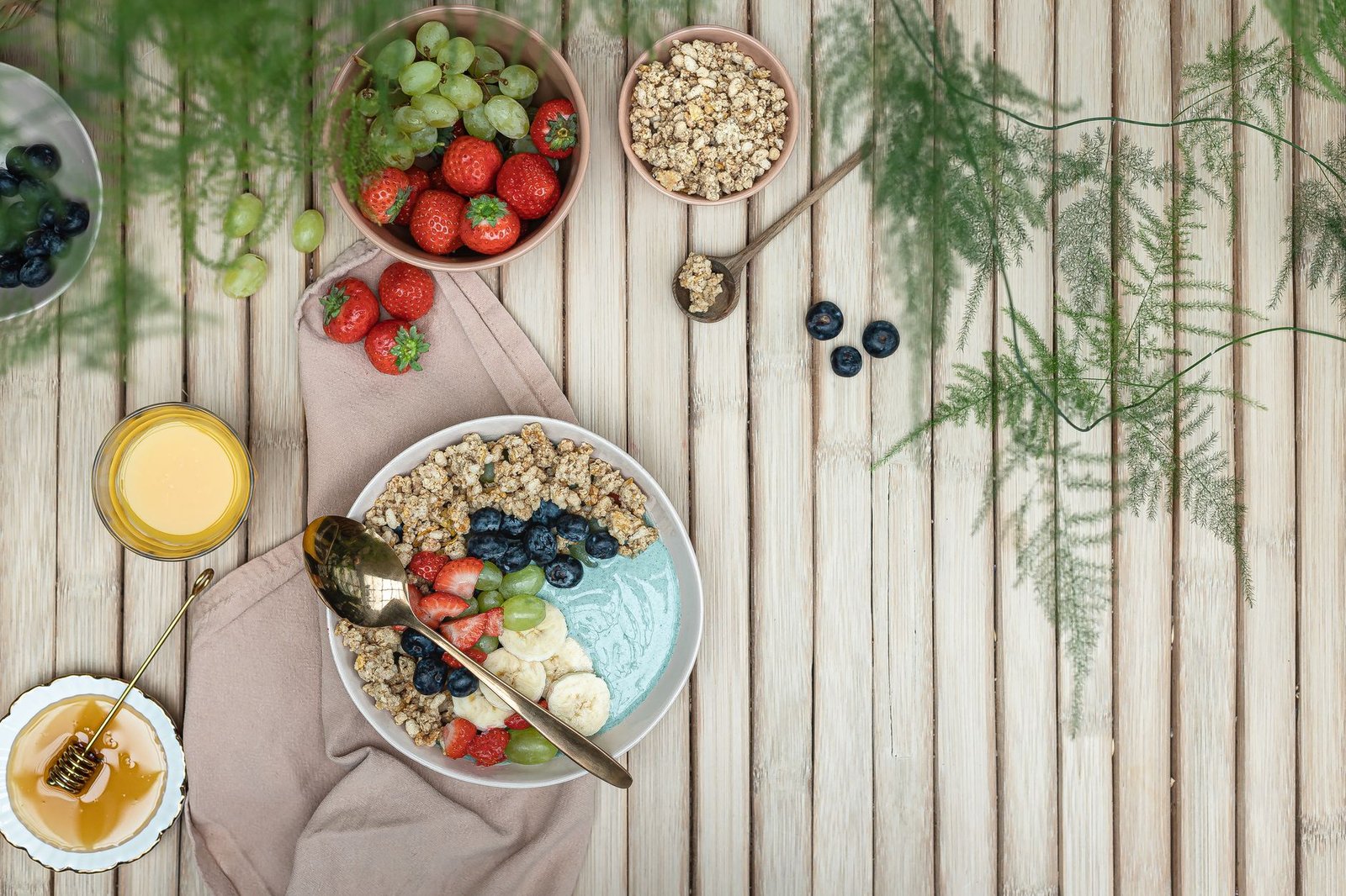 A bowl of Greek yogurt with honey and walnuts