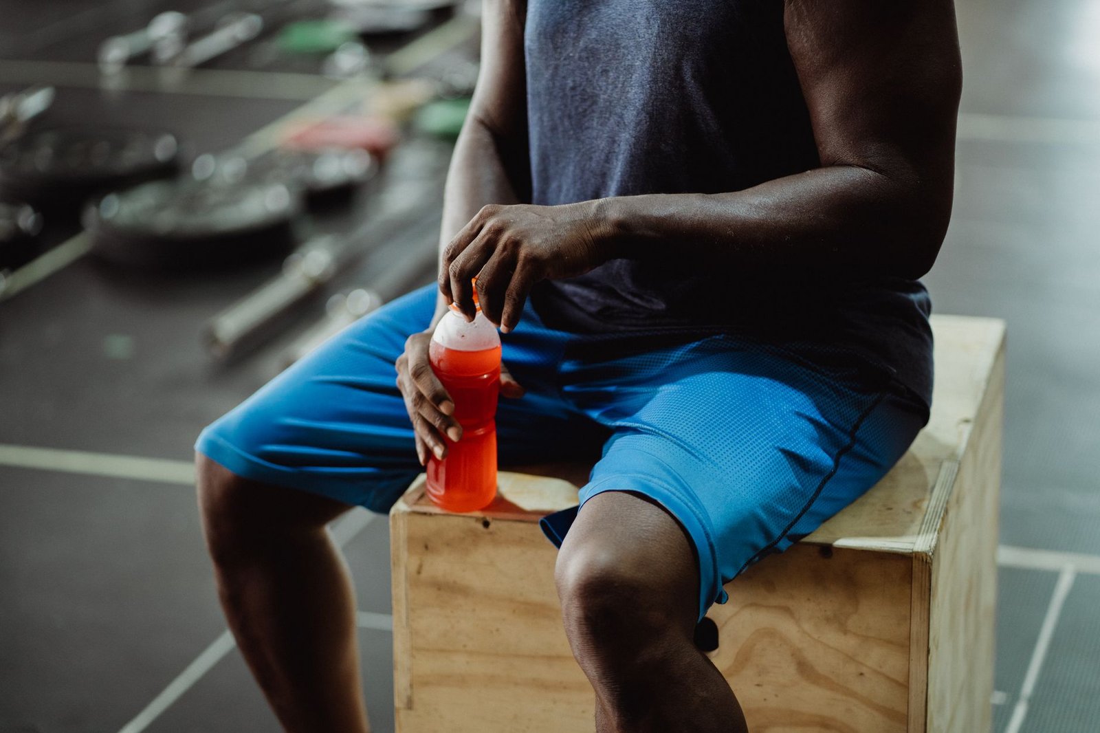 Athlete drinking beetroot juice before a competition