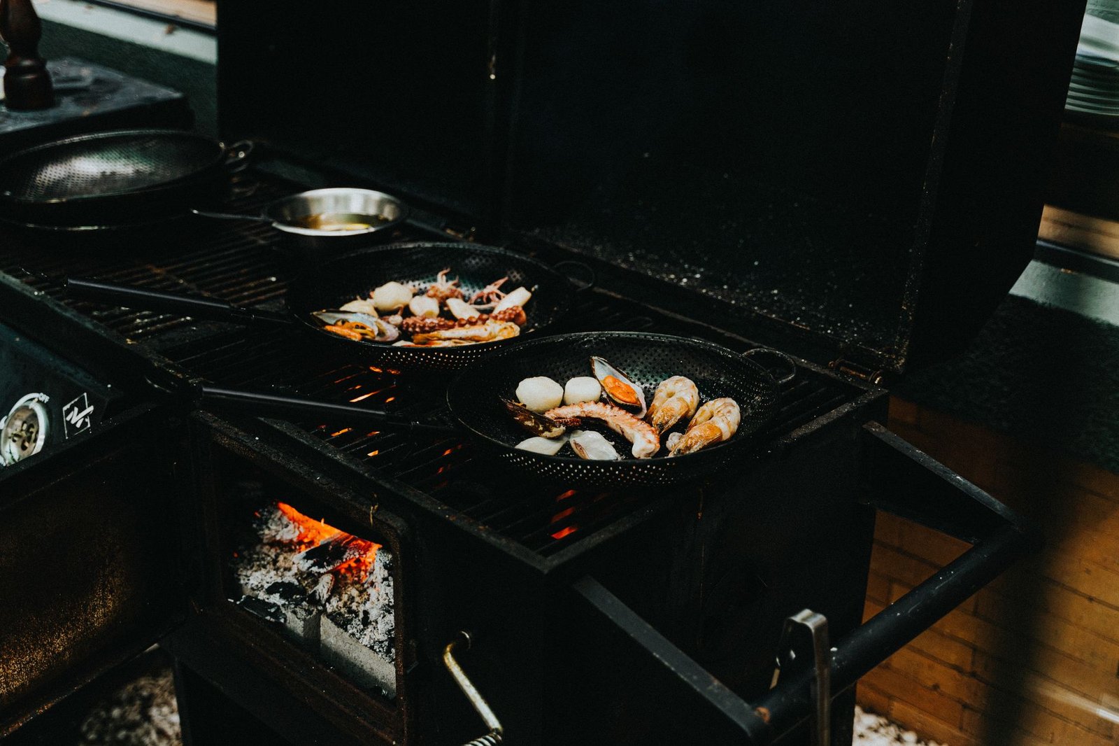 A dish of grilled octopus with lemon and herbs