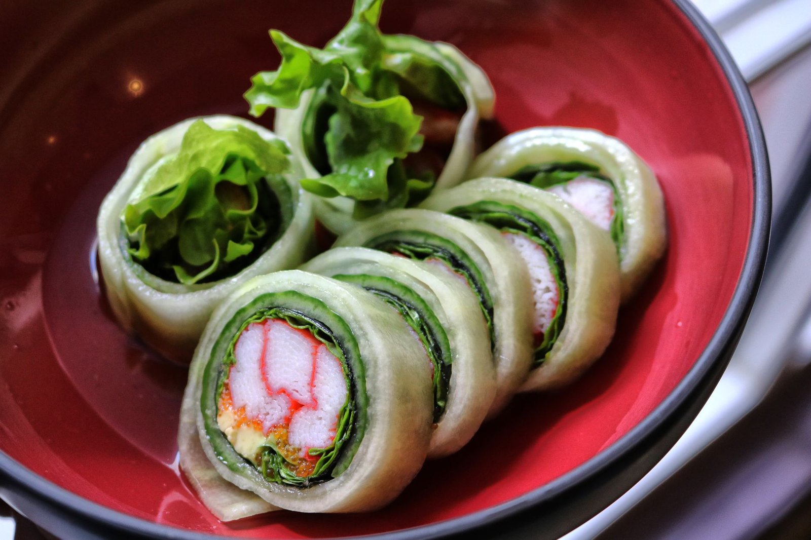 A healthy sushi roll with brown rice and fresh salmon